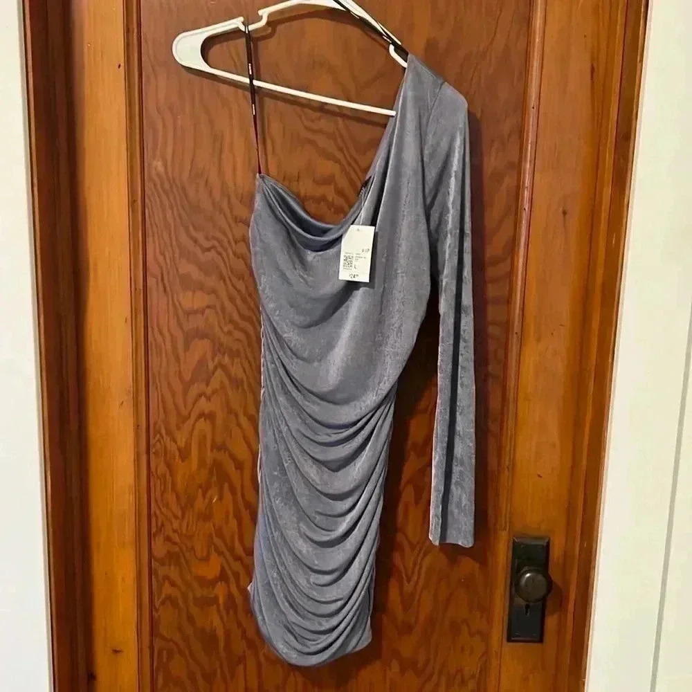 Forever 21 Woman’s asymmetrical dress 1041